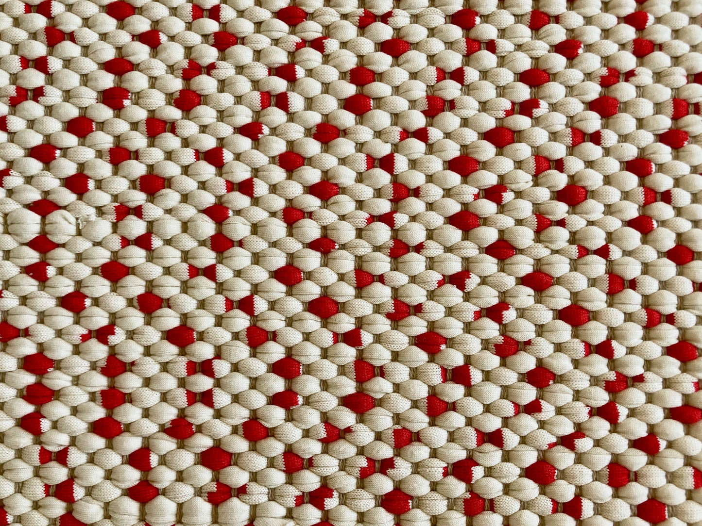 Red and white rug